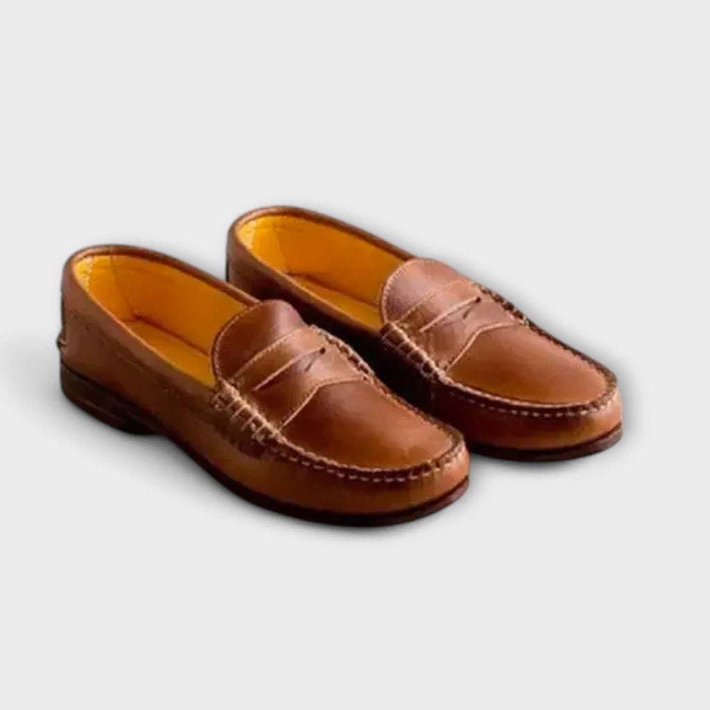 Betina mokkasiner med penny-strop, mørkebrune loafers med gule indersider