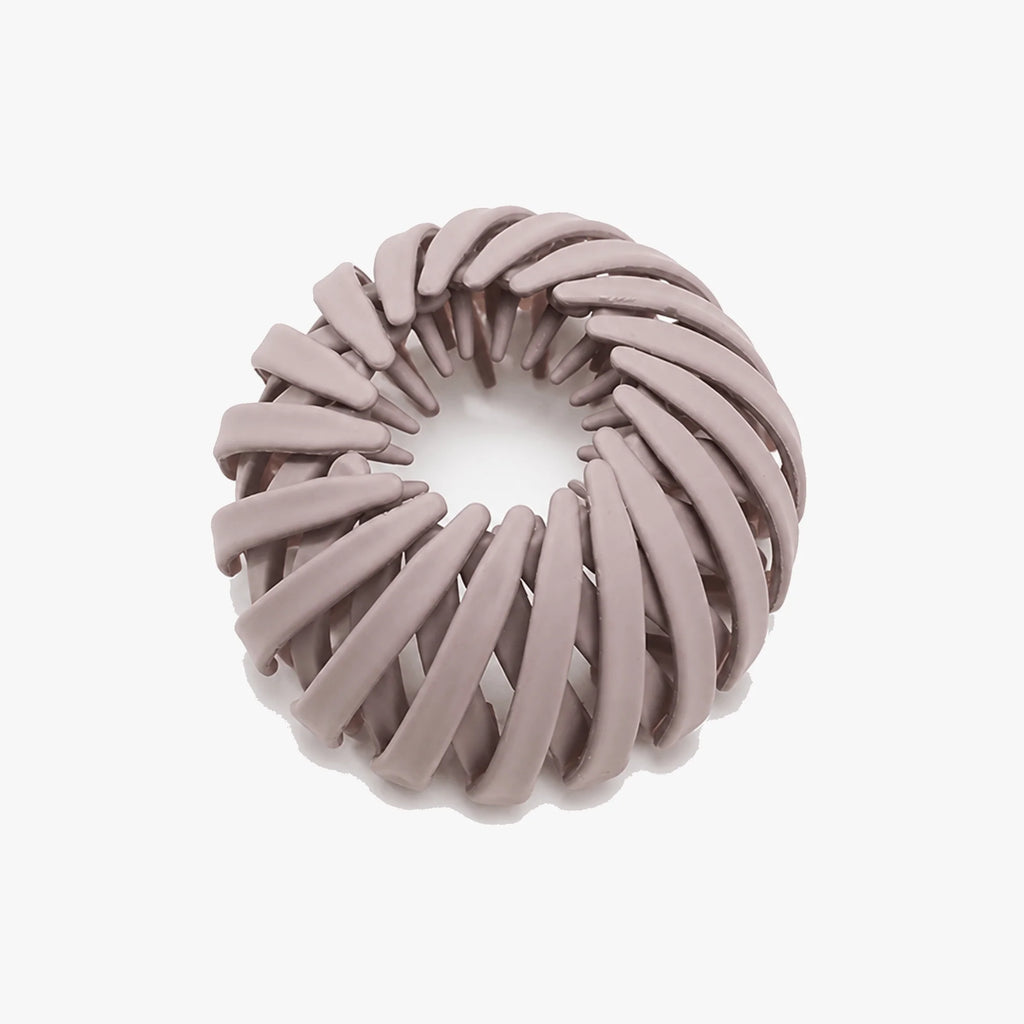 Hårspænde i fugleredeform i mauve med spiralribber