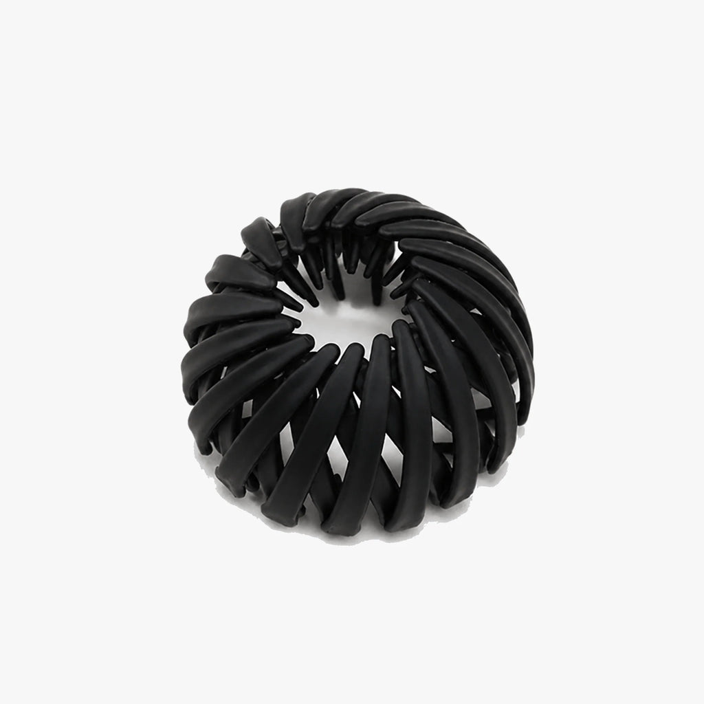 Hårspænde i fugleredeform i sort med spiralribber