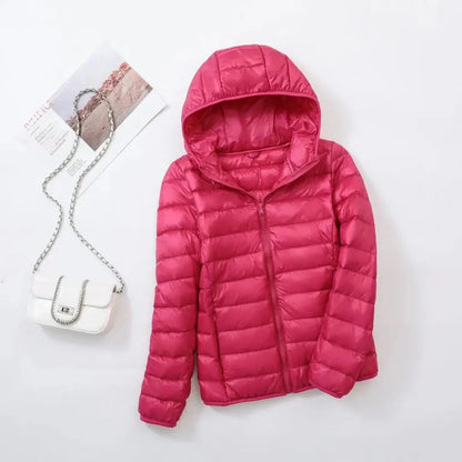 Iris | Long puffer jacket with hood and horizontal quilting