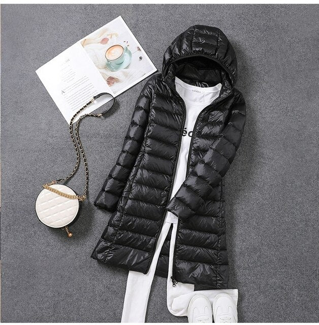 Iris | Long puffer jacket with hood and horizontal quilting