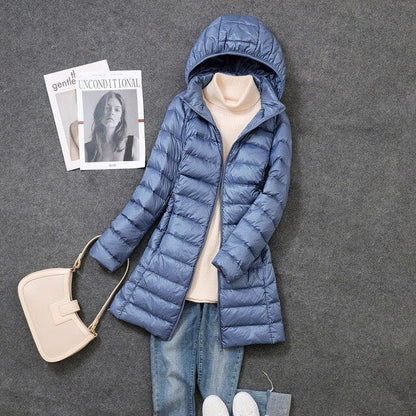 Iris | Long puffer jacket with hood and horizontal quilting