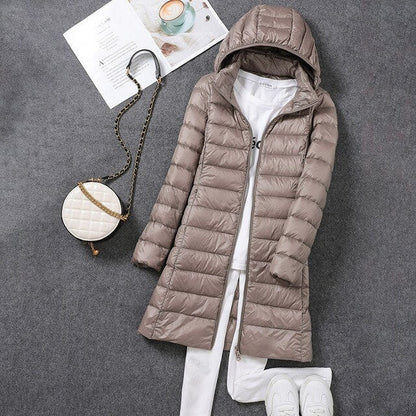 Iris | Long puffer jacket with hood and horizontal quilting