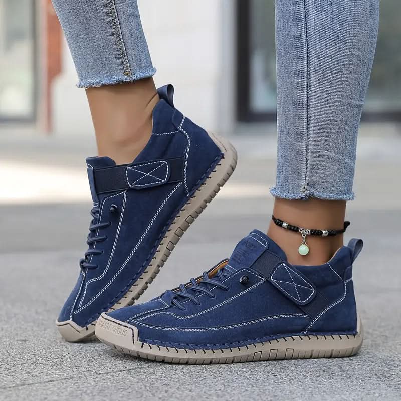 Mørkeblå sneakers med snørebånd, elastikstrop og profileret sål