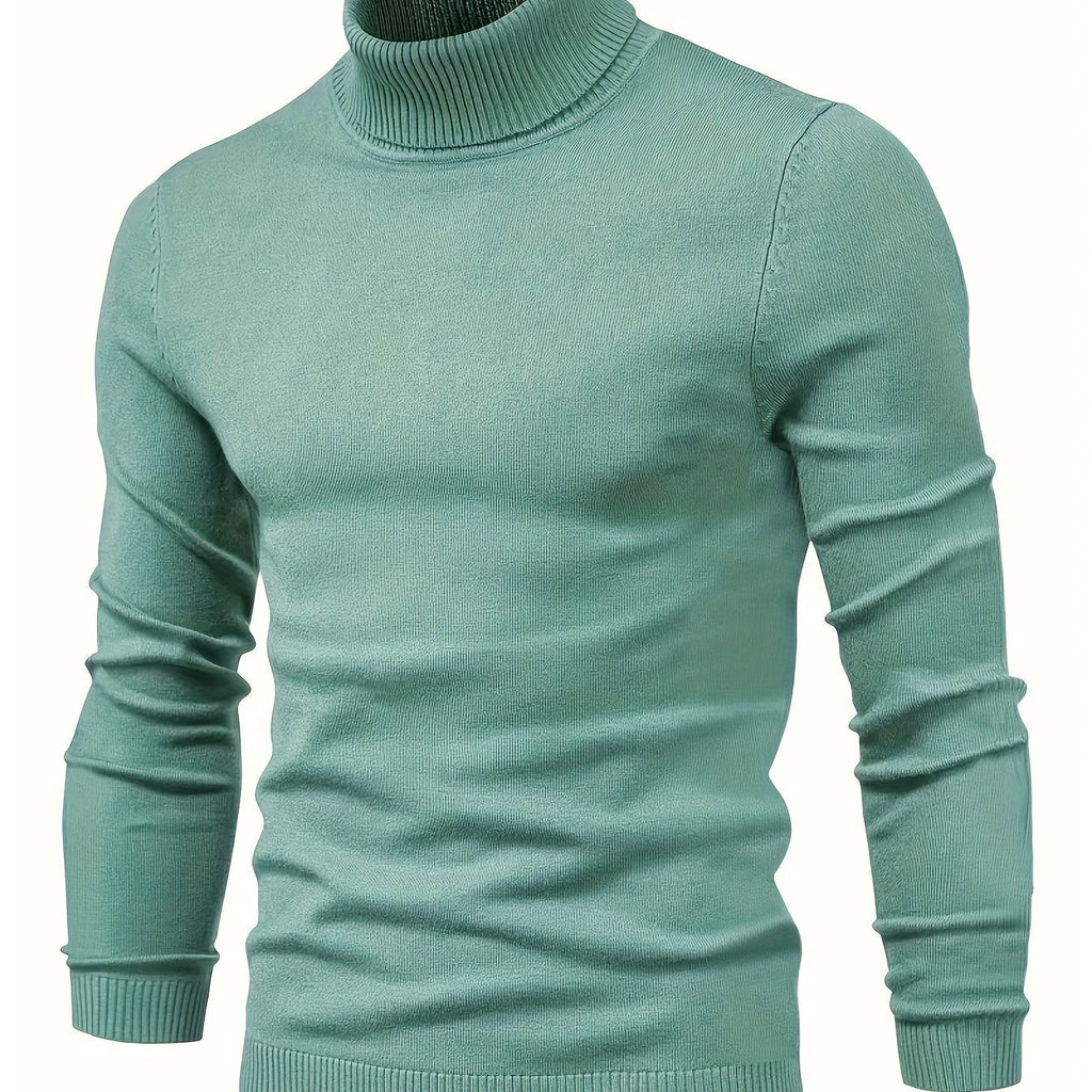 Klassisk sweater med høj hals i grøn med ribbet krave, manchetter og nederkant.