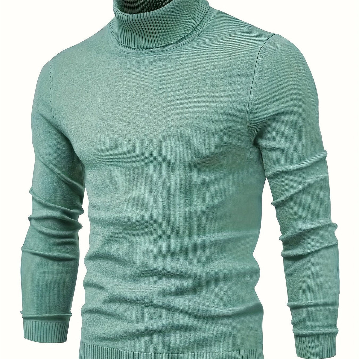 Klassisk sweater med høj hals i grøn med ribbet krave, manchetter og nederkant.