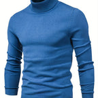 Klassisk sweater med høj hals i blå med ribbet krave, manchetter og kant.