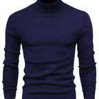 Klassisk sweater med høj hals i mørkeblå med ribbet krave, manchetter og nederkant.