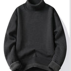 Maxwell højhalset sweater i mørk grå med ribkant ved hals, ærmer og nederkant