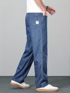 Afslappede blå jeans med lige ben og mærke i baglommen
