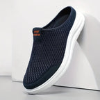 Blå slip-on sneakers med åben hæl, meshoverdel og hvid profileret sål