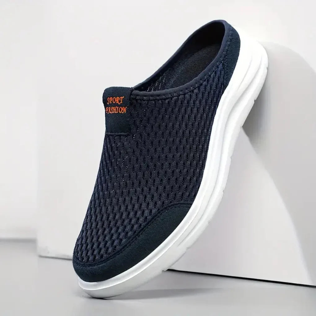 Blå slip-on sneakers med åben hæl, meshoverdel og hvid profileret sål