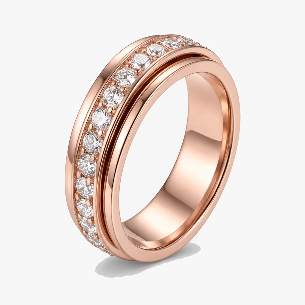 Rosegold ring med klar stenrække og poleret midterbånd