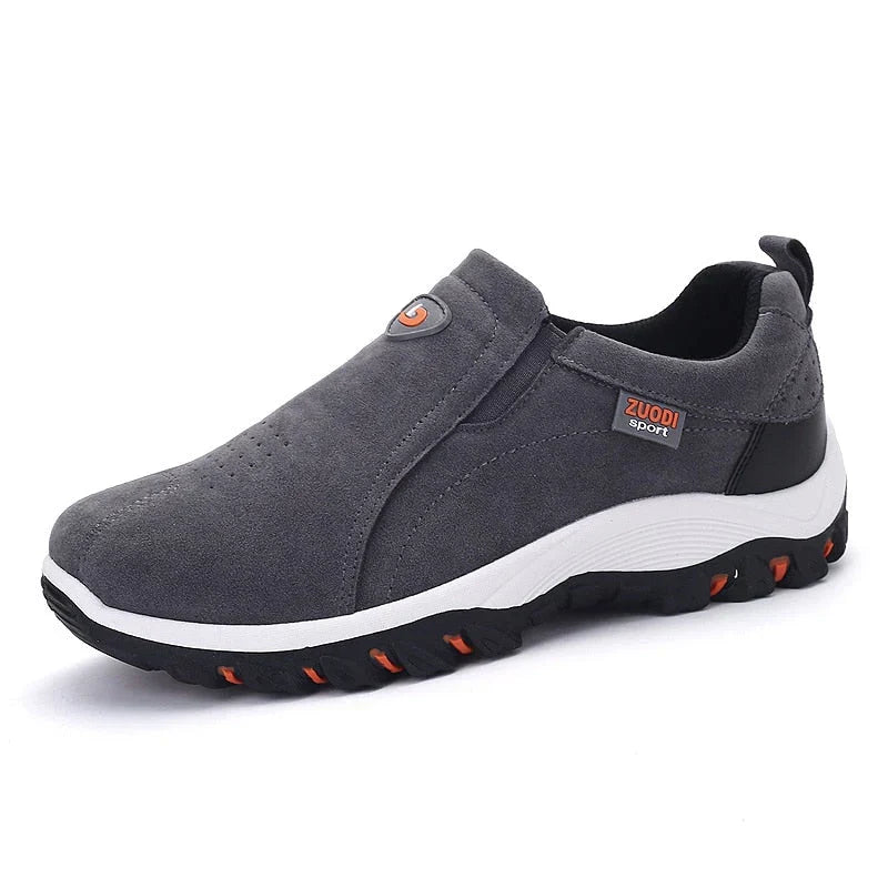 Grå slip-on sneakers med elastik i siden og kraftig tandsål